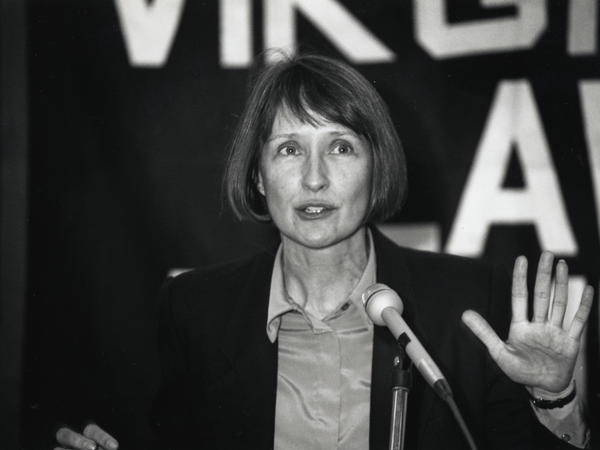 Black and white photograph of woman speaking