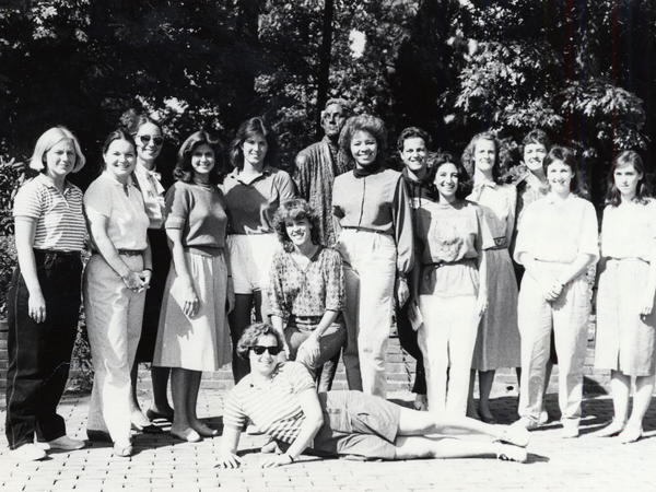 Black and white photograph of group of women standing outside