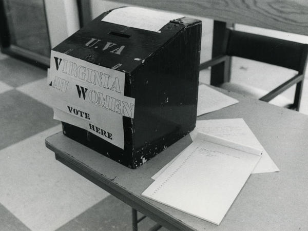 Black and white photograph of ballot box which reads "Virginia Law Women: Vote Here"