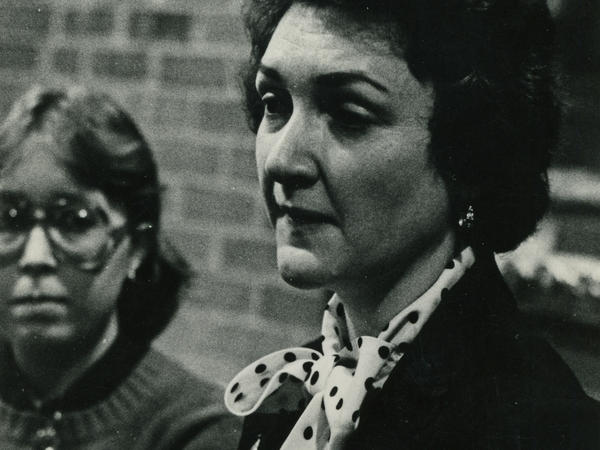 Black and white photograph of woman speaking