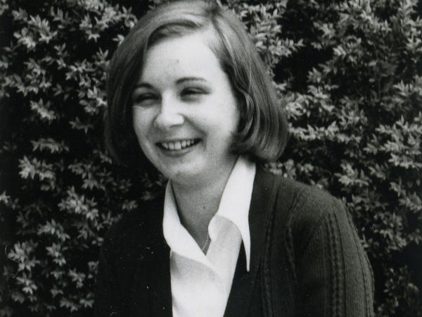 Black and white photograph of woman smiling