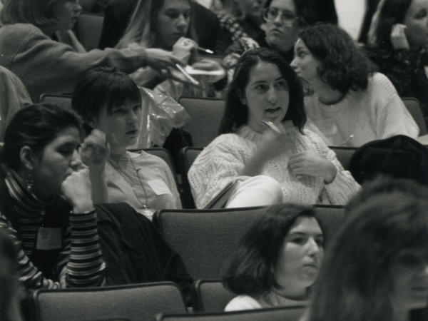 Black and white photograph of women in audience