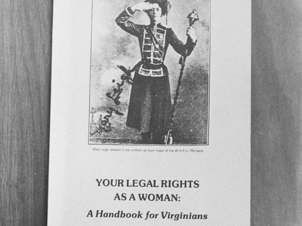 Black and white photograph of booklet titled Your Legal Rights as a Woman: A Handbook for Virginians