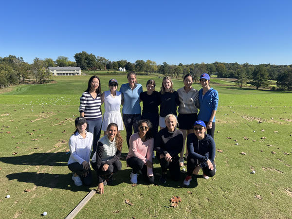 Color photograph of group of women on golf course